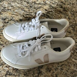 Woman’s Veja Leather Esplar Sneakers Gold